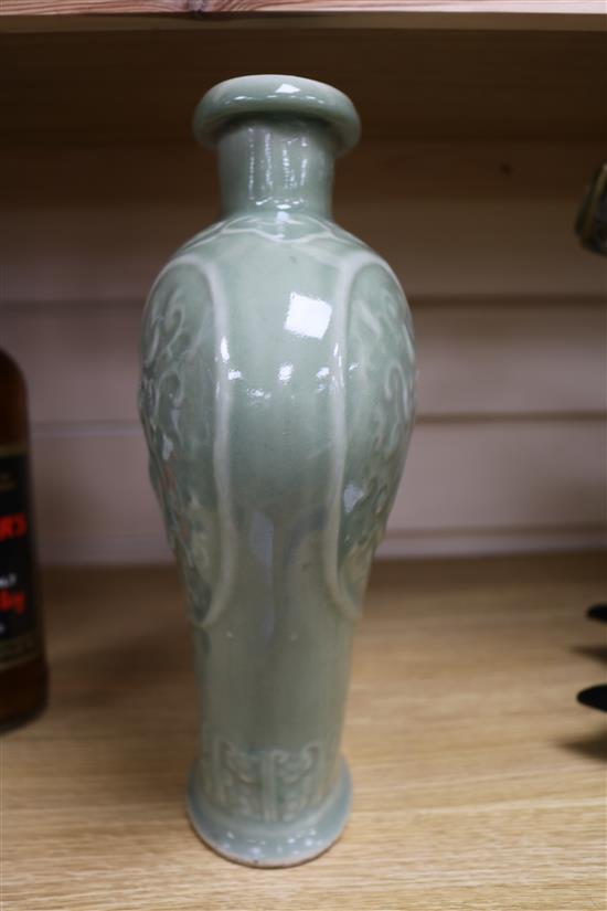 A Chinese celadon glazed vase height 18cm